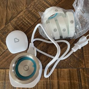 Munchkin compact bottle warmer with adapters